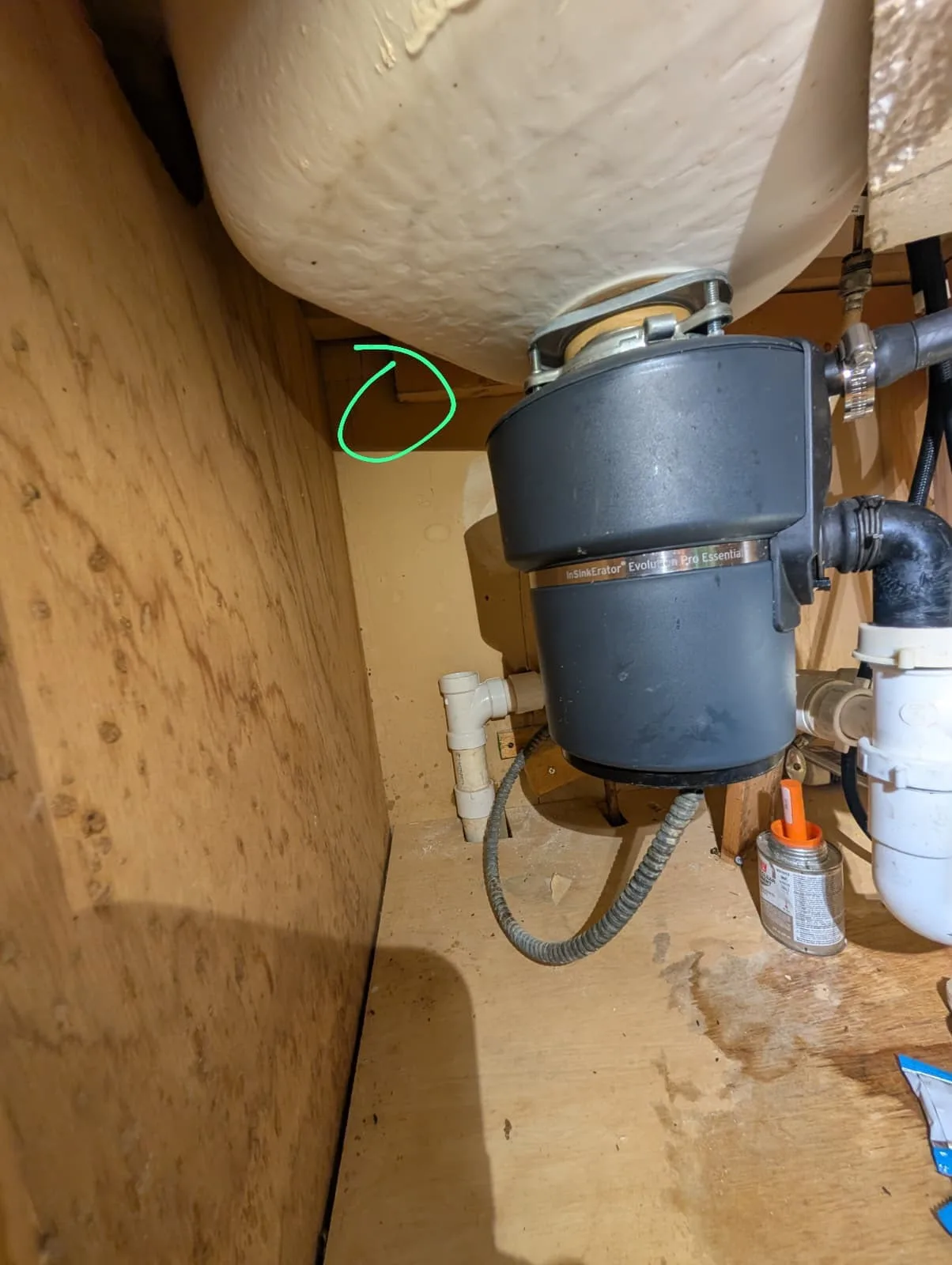 Garbage disposal unit installed under a kitchen sink